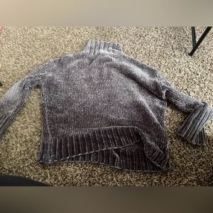 Sweater with knit material